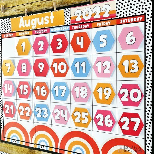 Fully assembled retro themed classroom calendar printed from home featuring bright colors, months, year, and date cards