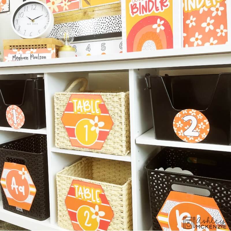 Classroom bins are labeled with hexagon shaped tags in bright tones.