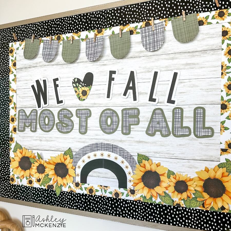 A classroom bulletin board decorated for fall with a sunflowers theme