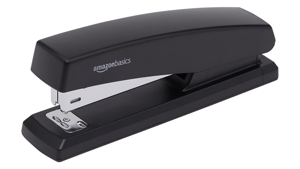 An Amazon Basics brand stapler is a classroom bulletin board essential item