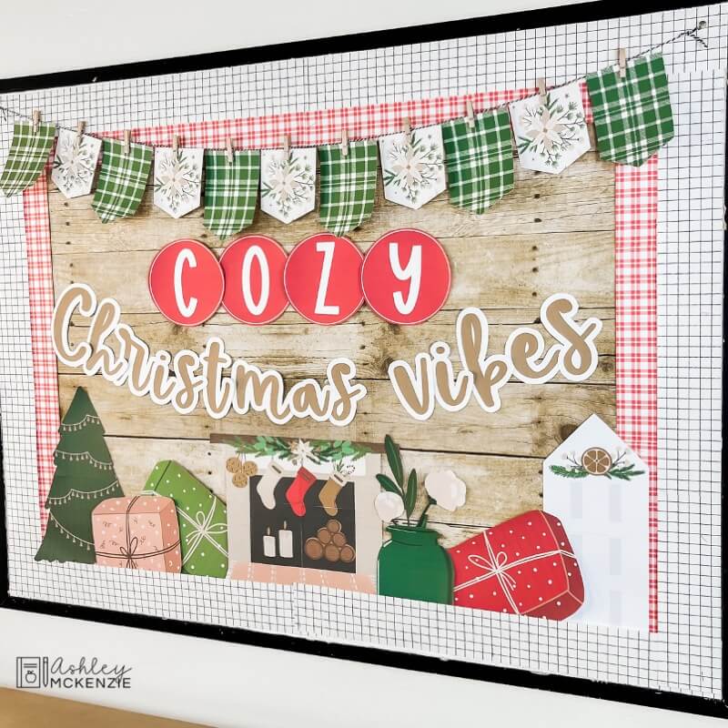A classroom bulletin board decorated for the holiday season with the saying "Cozy Christmas Vibes"