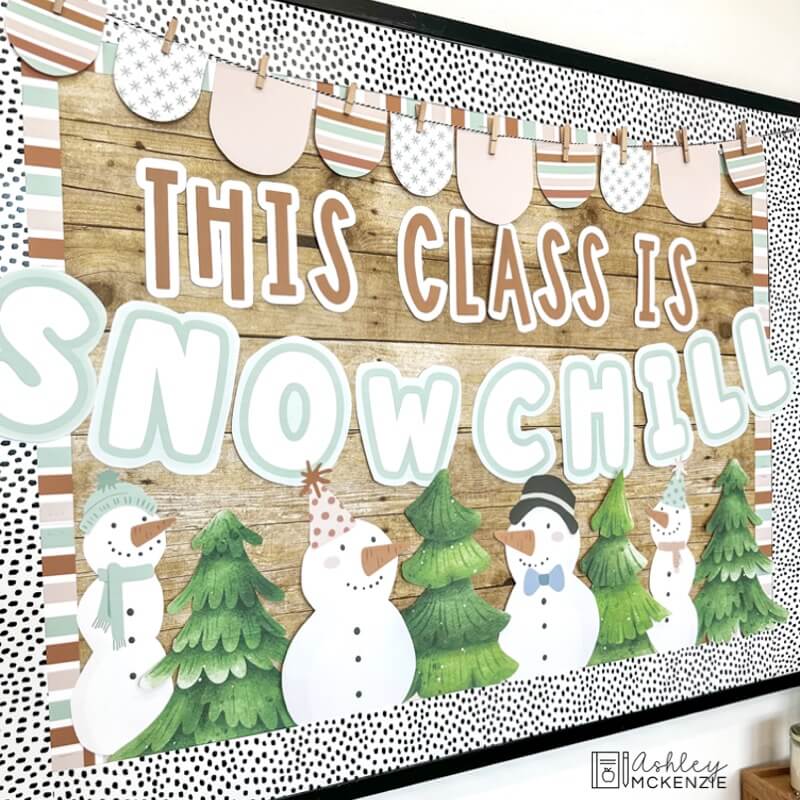 A classroom bulletin board decorated for winter with the saying "This Class is Snowchill" 