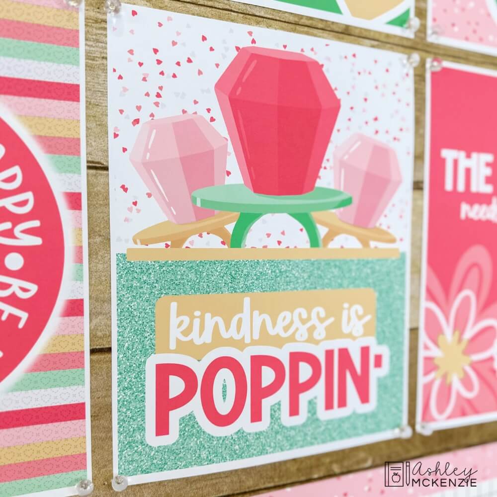 A close up of a Valentine's Day themed classroom poster with the saying Kindness is Poppin'