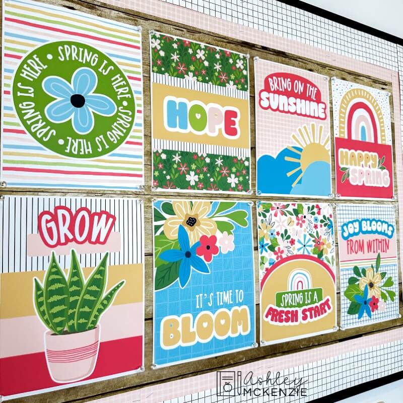 A classroom bulletin board decorated with spring classroom decor featuring colorful classroom posters with uplifting sayings